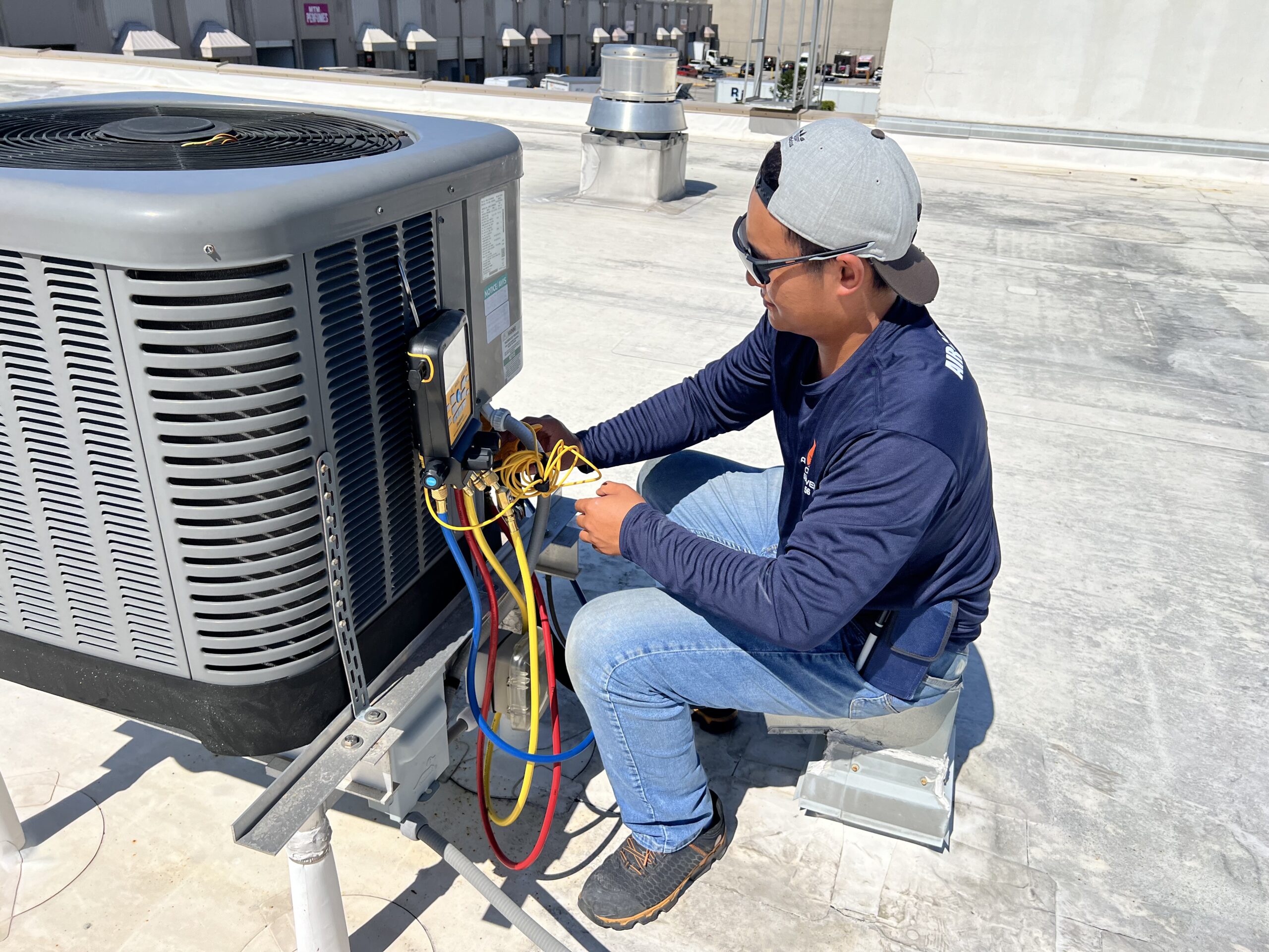 AKS technician testing AC system